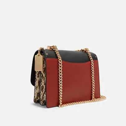 Klare Crossbody In Signature Canvas With Rivets