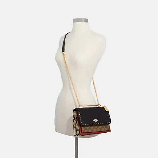 Klare Crossbody In Signature Canvas With Rivets