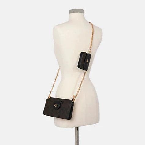 Poppy Crossbody In Signature Canvas